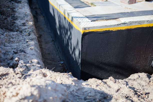 Professional Emergency Waterproofing technician working in Pierson, MI